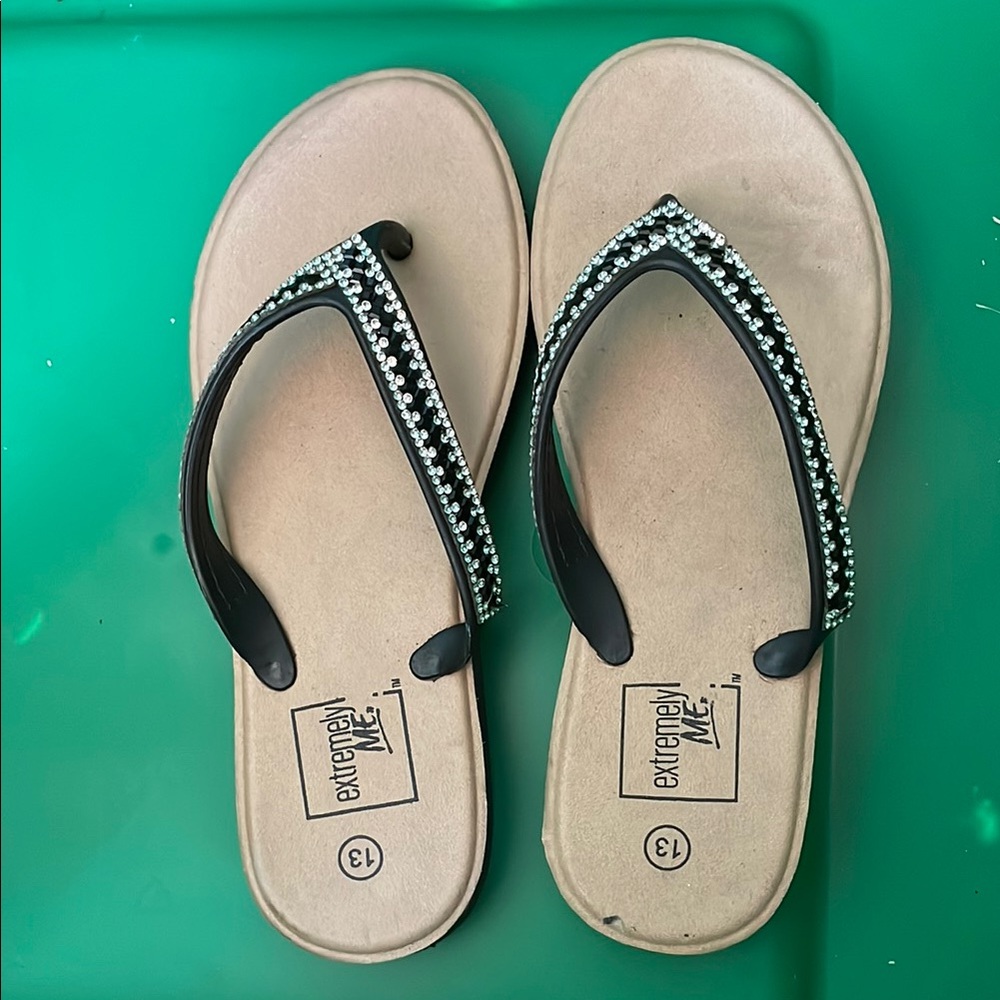 Elegant Black Sandals with Metallic Embellishments